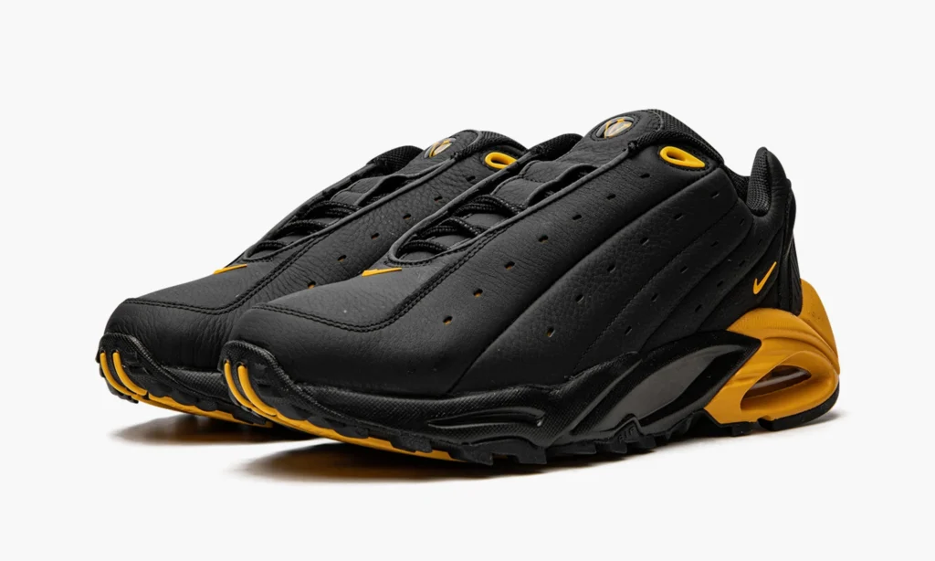 nike nocta hot step air terra black / university gold