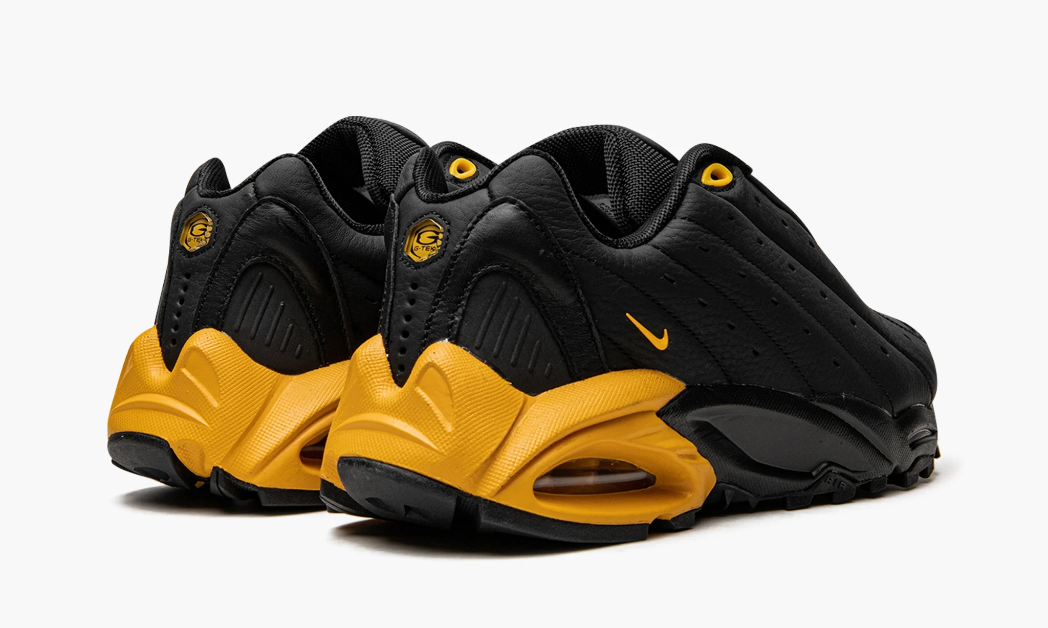 nike nocta hot step air terra black / university gold
